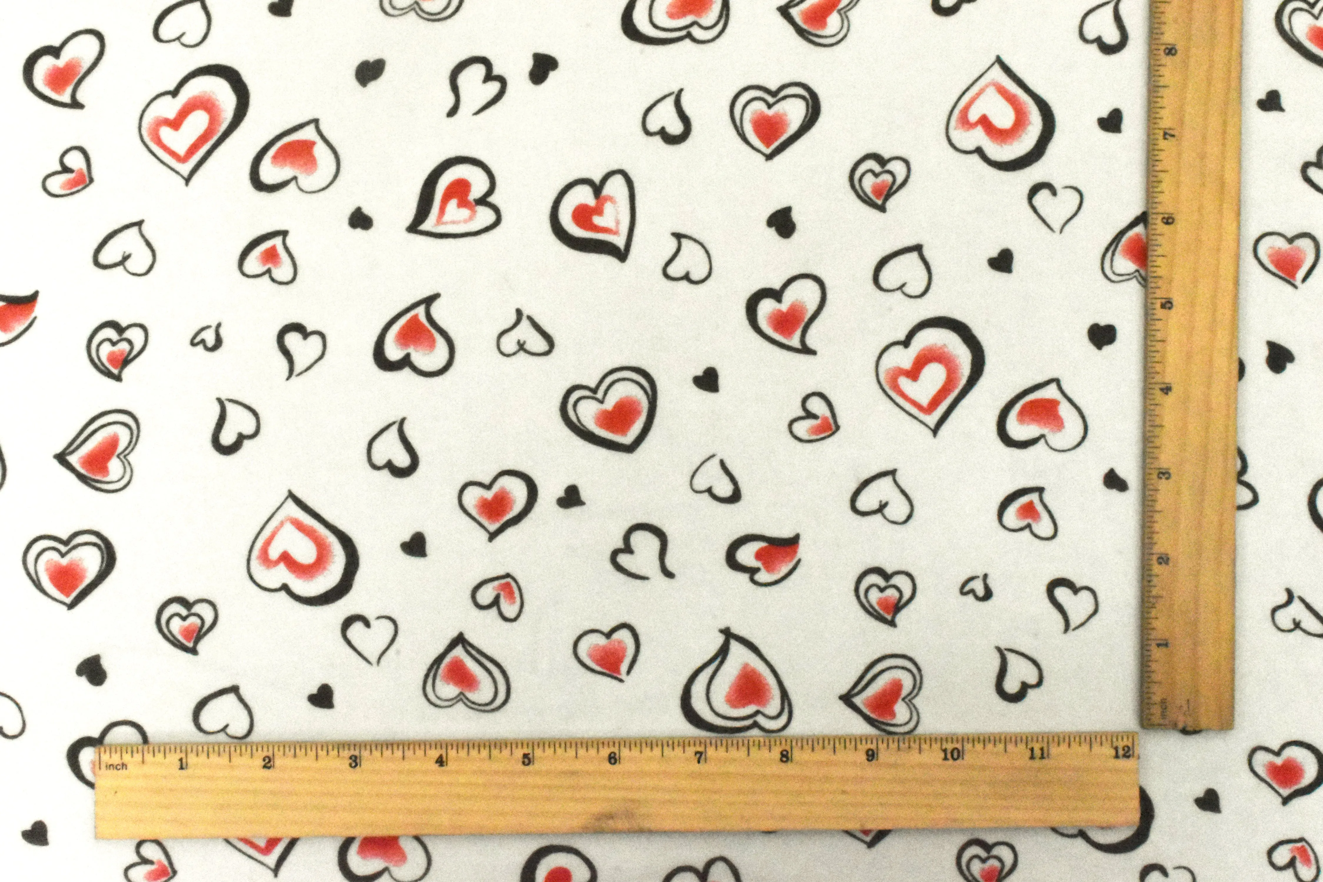 Ivory-Black-Red Heart Printed Poly Chiffon Woven Fabric